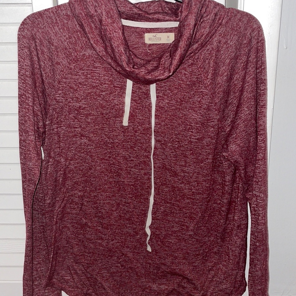 Red Hollister top in size medium with neck piece.